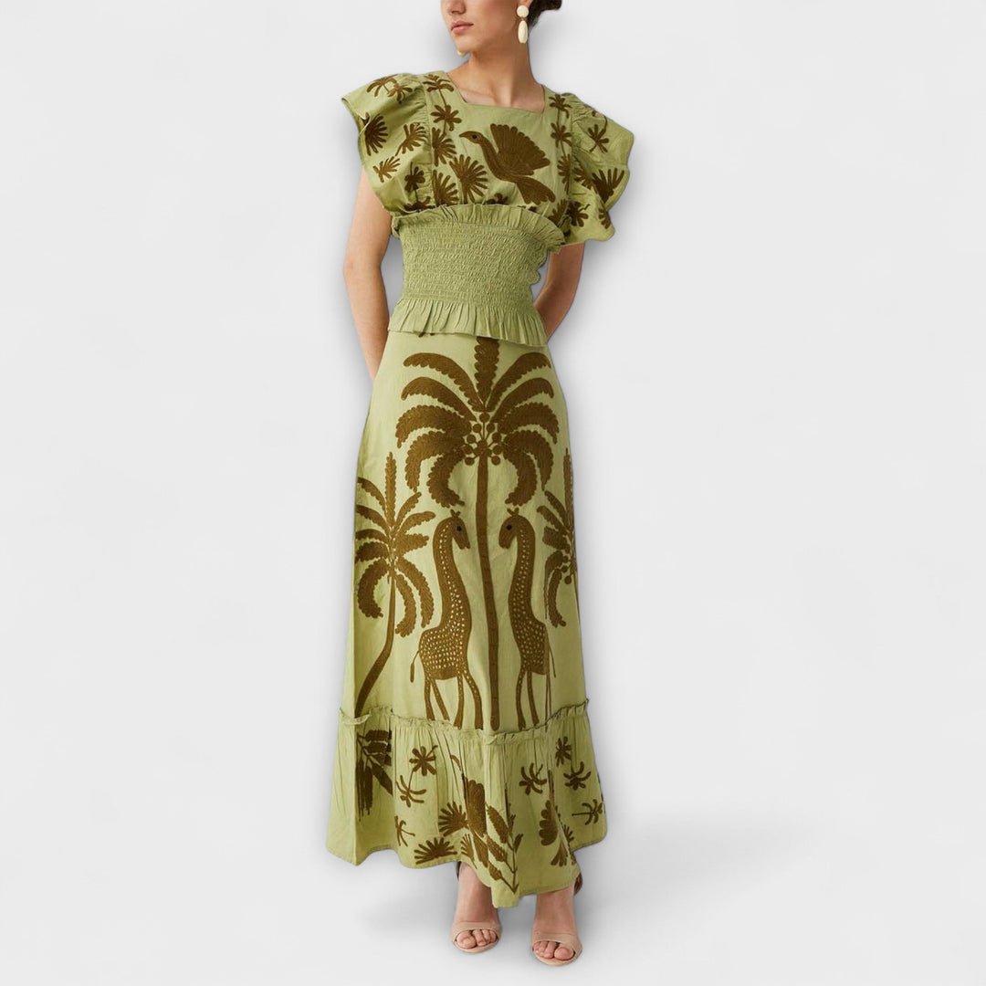 Elegantna brezrokavna majica z vzorcem palm in tropskih ptic