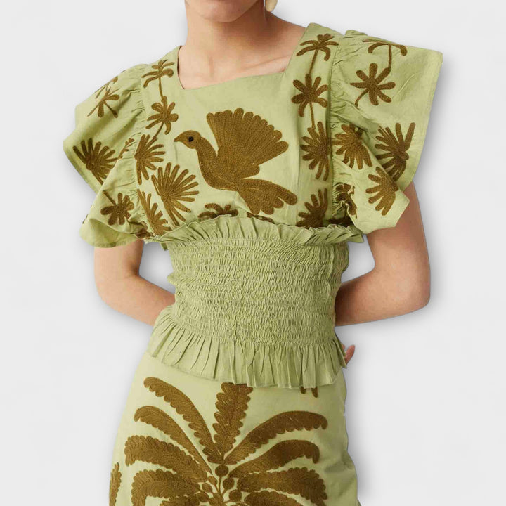 Elegantna brezrokavna majica z vzorcem palm in tropskih ptic