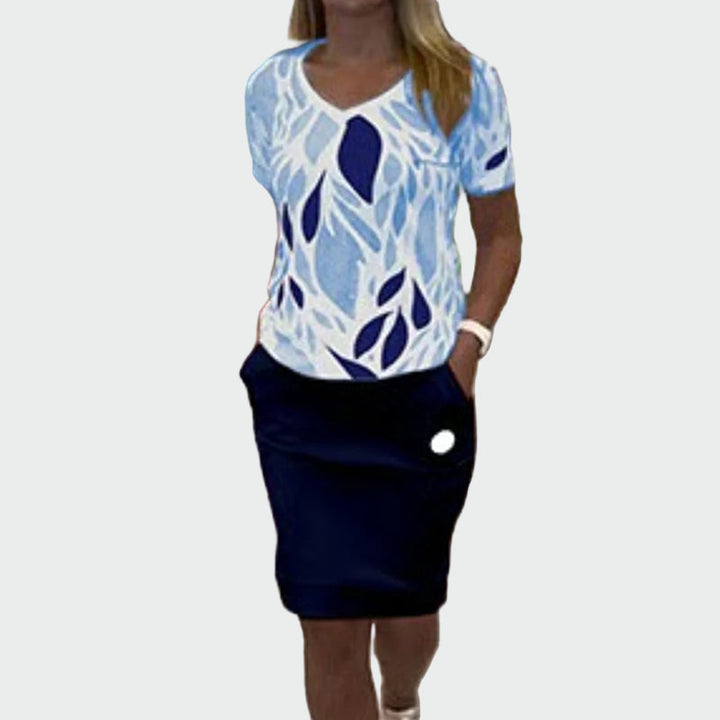 Eleganten komplet s potiskom in stilskim krilom