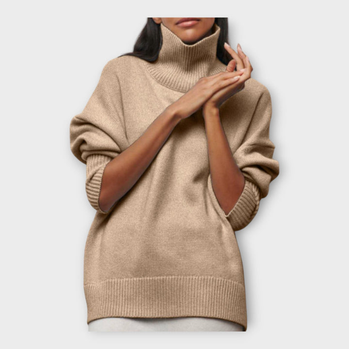 "Pleteni pulover z visokim ovratnikom" can be rewritten as "Pulover z visokim ovratnikom iz pletenine".