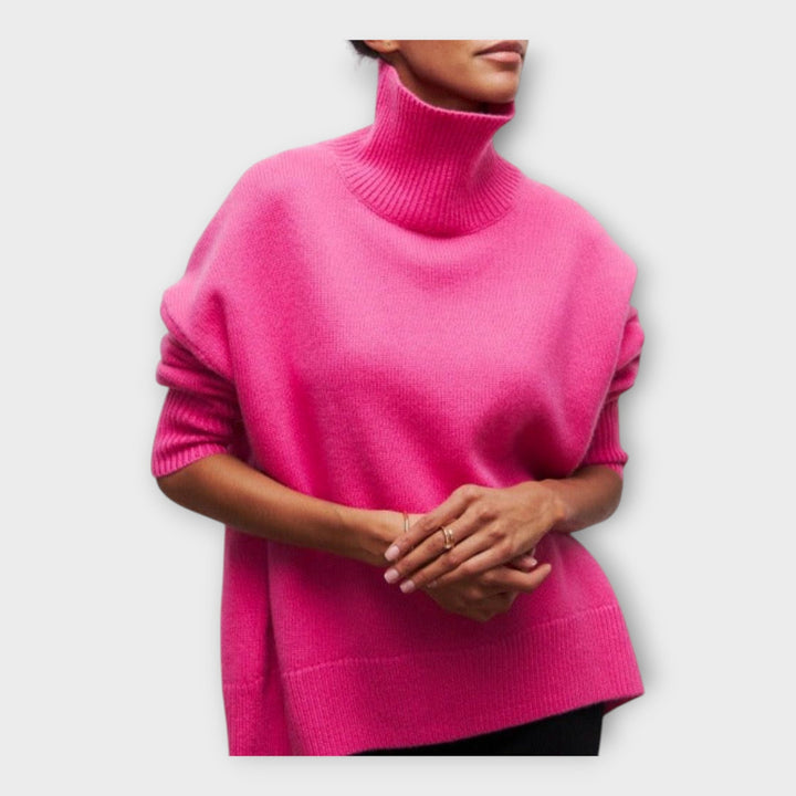 "Pleteni pulover z visokim ovratnikom" can be rewritten as "Pulover z visokim ovratnikom iz pletenine".