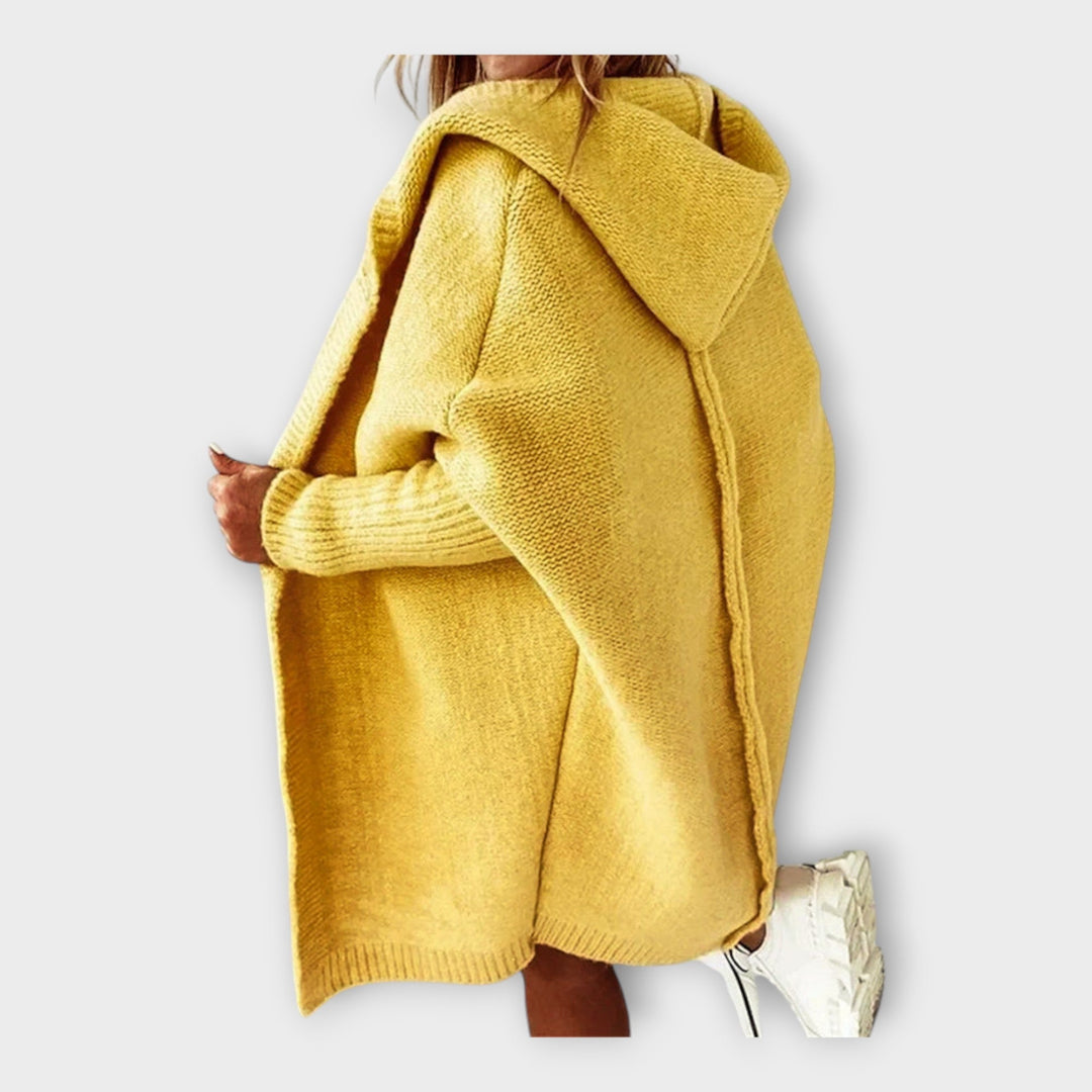 "Pleteni jopič s kapuco" can be rewritten as "Kapučasti pleteni jopič".