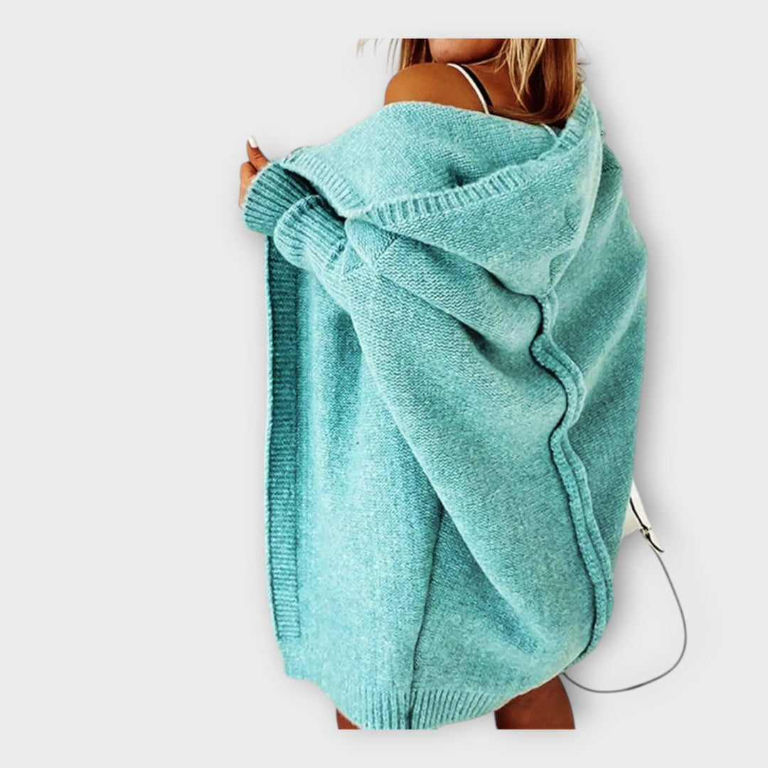 "Pleteni jopič s kapuco" can be rewritten as "Kapučasti pleteni jopič".