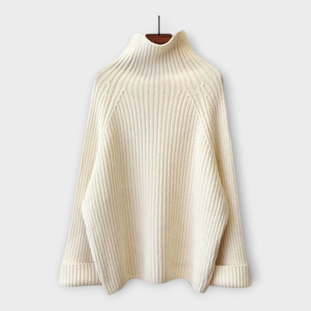 Set z visokim ovratnikom, hlačami in brezrokavnikom